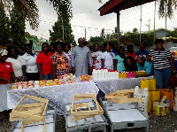 Hon. Carlos Kingsley  Ahenkorah with the beneficiaries