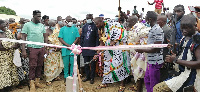 Nana Ette Akrade II and officials cutting the sod for the contruction