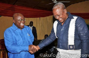 Nana Addo shakes hands with President Mahama