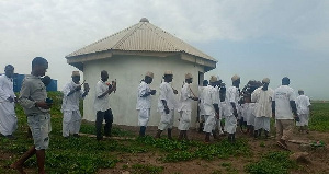 Young maidens, traditional leaders, priests, and priestesses gathered