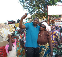 John Dumelo with Tamale market women