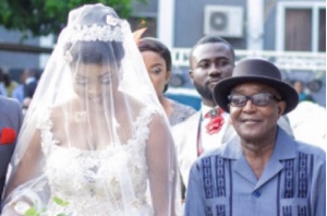 Akosua Vee and late father on her wedding day