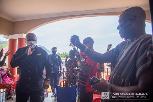 Former President, John Dramani Mahama exchanging pleasantries with Tongor traditional leaders