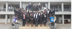 Some young Ghanaian lawyers in a group photo with High Court Judges