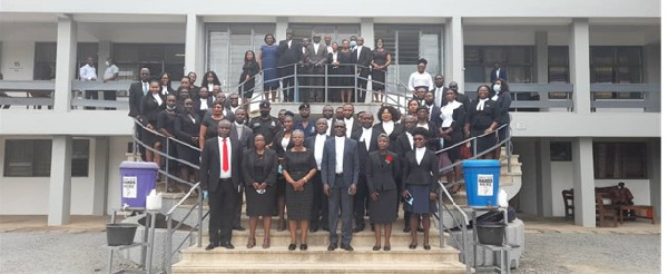 Some young Ghanaian lawyers in a group photo with High Court Judges