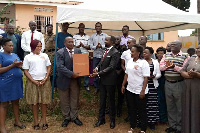 Justice Philip Odoki (right in a black suit) launching the Small Claims Procedure system