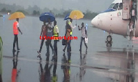 Passengers who disembarked had to walk about 100 metres in the rain to get to the arrival hall