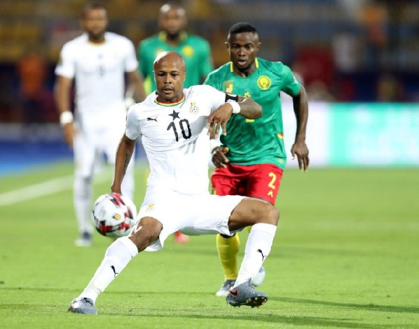 Ghana's Andre Ayew control the balling the ball during the game