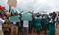 The sit-down strike is in protest to the mass encroachment on lands in front of the medical facility