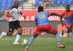 Ghana's forward Andre Ayew (L) advances with the ball during the 2017 AFCON quarter-final match