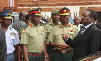 President Mnangagwa speaks to Commander Zimbabwe Defence Forces with  Lieutenant-General Edzai Chimo