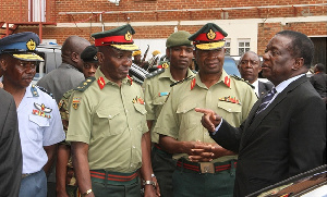 President Mnangagwa speaks to Commander Zimbabwe Defence Forces with  Lieutenant-General Edzai Chimo