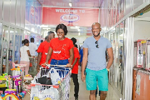 A happy Vodafone customer shopping at the mall