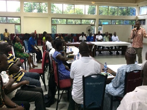 Emmanuel K. Dartey at a quarterly review meeting of the Girl Advocacy Alliance