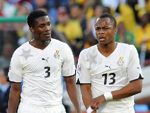 Asamoah Gyan and Andre Ayew