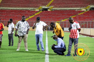 Officials during the inspection