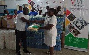 Senior Nursing officer Josephine Owusu-Takyi (R) received the items on behalf of the hospital