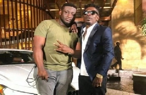 Dancehall artiste, Shatta Wale with his manager, Julio Cyriaano