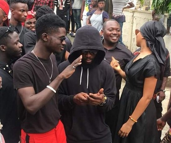 Kuami Eugene wore what looked like a faded black t-shirt to Ebony's one-week memorial