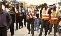 Officials of Jumia touring the new warehouse