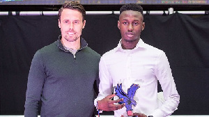 Malachi Boateng displaying his trophy