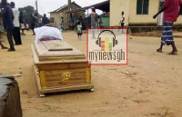 The coffin in the middle of the street