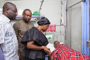 Lydia Alhassan interacting with a victim of the shooting incident