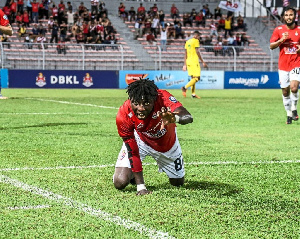 Jordan Mintah in a celebratory mood after scoring