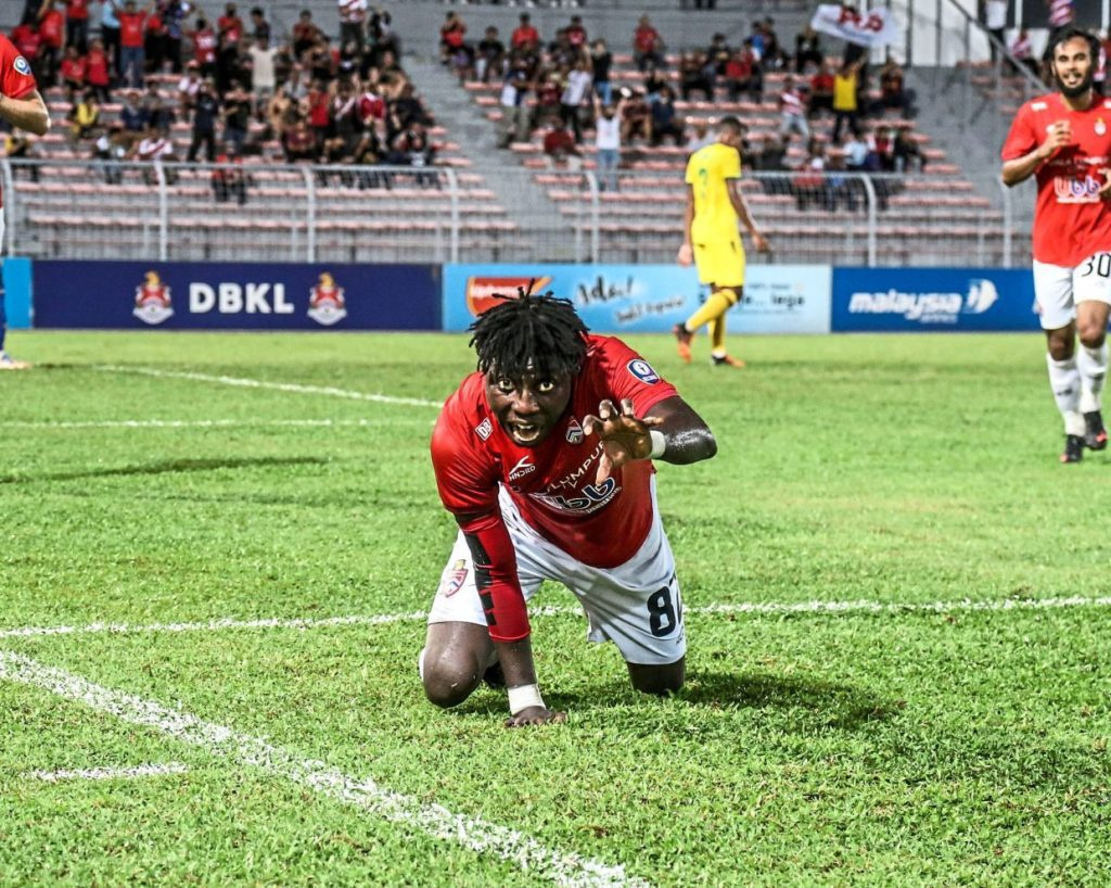 Jordan Mintah in a celebratory mood after scoring