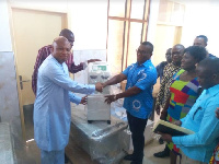 Ablakwa presenting the equipment to the neonatal intensive care unit of the Battor Catholic Hospital