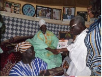 Senior Minister shakes hands with Ya Na Abubakari Mahama II