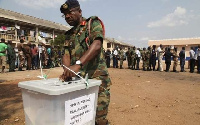 A military man voting during a special voting exercise