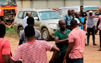 Some residents in deliberations at the Suame Magazine in Kumasi