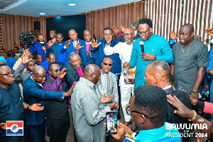 Dr. Mahamudu Bawumia surrounded by the clergy