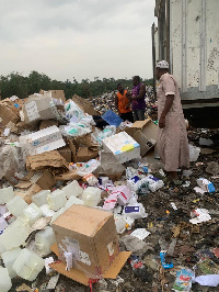 FDA supervising burning, crushing, and burying of unwholesome products at Akwadum dump site