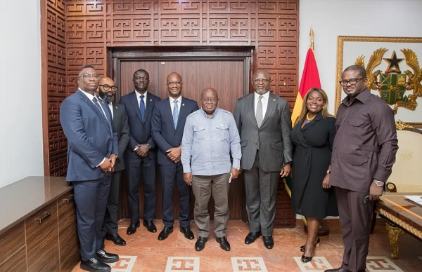 Officials of the bank with President Akufo-Addo and Charles Adu Boahen