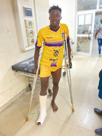 Justice Blay in crutches