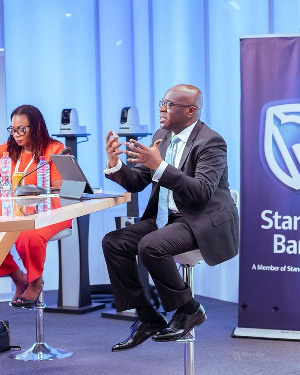 CEO of Stanbic Bank Ghana, Kwamina Asomaning speaking at the 2021 Business Roundtable