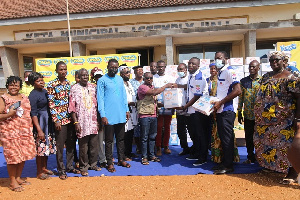 Officials of Promasidor Ghana with beneficiaries