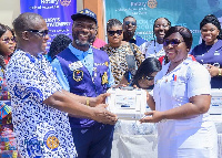 President of the Rotary Club of Accra-East, Serge Sourou Oga presenting thermal coagulators