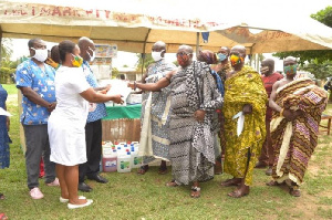 The KU Friends Club presenting the items to Nana Asare Panyin IV, Krontihene of Agona Kwanyako