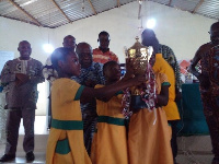 St. Michael Roman Catholic Primary students receive a trophy