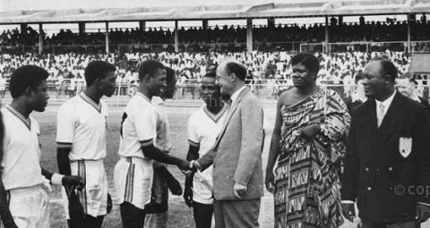 Black Stars' Dogo Moro receiving a pre-match handshake before a Black Stars