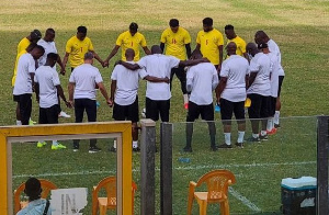 Blacks Stars players (in yellow) begin training for crucial game