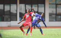 Asante Kotoko's Yussif Mubarick in a jostling with RTU's Agustine Frompong