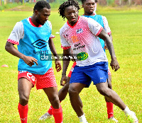 Sulley Muntari (right) joined Hearts this week