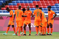 Ivorian players celebrate a goal from the 2 - 1 win against Saudi Arabia