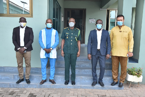 CGI, Mr. Kwame Asuah Takyi (m) in a group photograph with Kurt Okraku, Jamel Maraby, Anim Addo