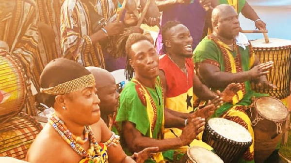 Some elated cultural group drumming for some diasporans