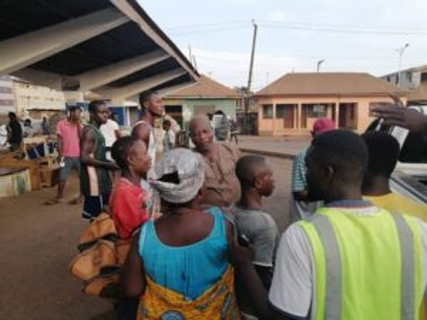 A section of residents awaiting the food